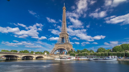 The Eiffel tower timelapse  from embankment at the river Seine in Paris