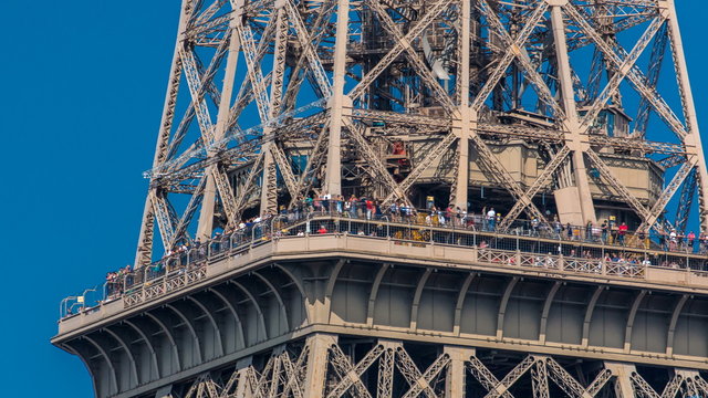 Close up view of middle section of the Eiffel Tower timelapse in Paris, France.
