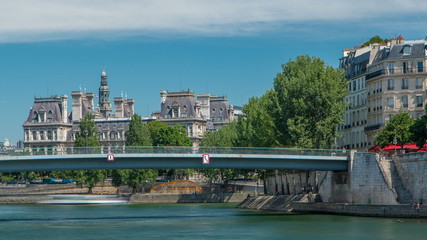 Saint-Louis bridge timelapse. Two islands on the River Seine in Paris, France, called Ile de la cite and Ile saint Louis. Paris, France. - obrazy, fototapety, plakaty