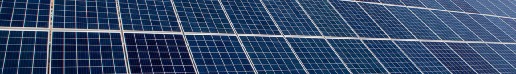 Obraz premium Panorama Solar Panels background for solar energy concept images.