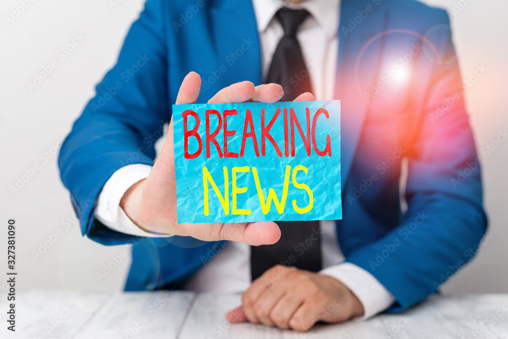 Poster writing note showing breaking news. business concept for newly received info about an event and curr