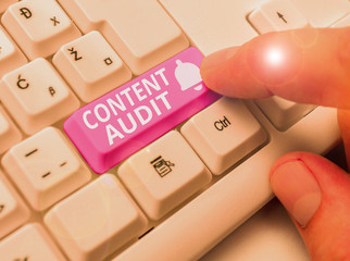 Writing note showing Content Audit. Business concept for process of evaluating content elements and information