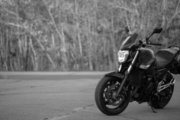 Obraz na płótnie Canvas Black sports motorcycle close-up on the street.