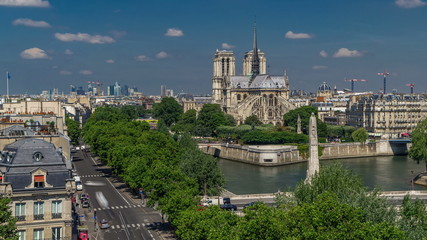 Paris Panorama with Cite Island and Cathedral Notre Dame de Paris timelapse from the Arab World Institute observation deck. France.