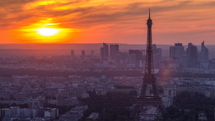 Fototapeta premium Panorama of Paris at sunset timelapse. Eiffel tower view from montparnasse building in Paris - France