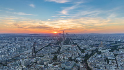 Panorama of Paris at sunset timelapse. Eiffel tower view from montparnasse building in Paris - France