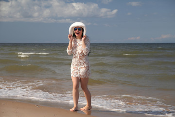Beautiful woman enjoying summer outdoors