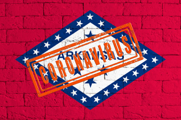 Flag of the State of Arkansas painted on grungy wall background