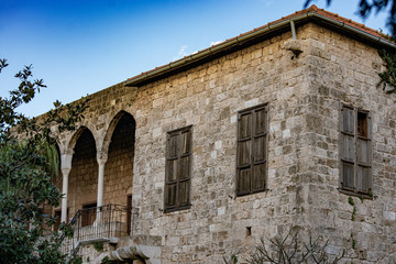 Fototapeta na wymiar Historic abandoned stone house in the Lebanese town of Byblos