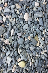 background pattern of round pebble stone. pebbles texture.