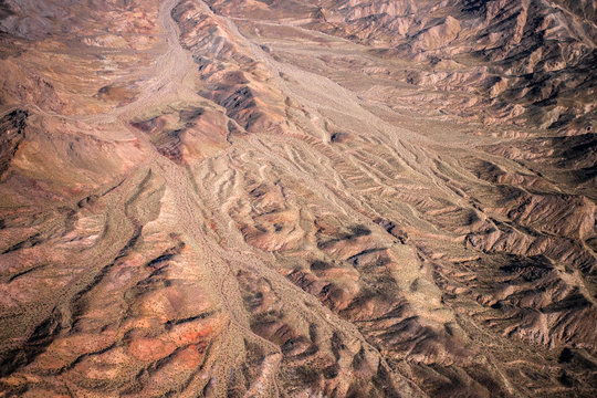 Aerial Photography Over Western United States With Landforms, Desert And Mountains In View