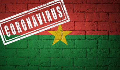Flag of the Burkina Fasoon brick wall texture.