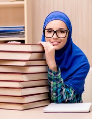 Muslim girl preparing for entry exams