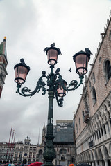 Fototapeta na wymiar lamppost on st marks square in venice italy
