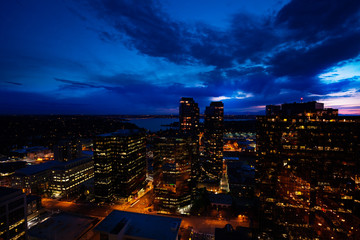 Fototapeta na wymiar Night panorama of Bellevue city downtown of King County, United States across Lake Washington from Seattle