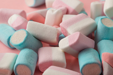 marshmallow candy on pink background, top view
