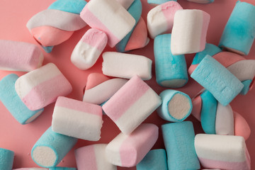 marshmallow candy on pink background, top view