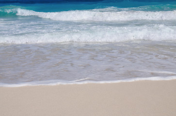 Fototapeta na wymiar Wave and Sand