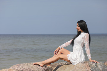 Beautiful woman in white dress
