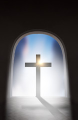 Fototapeta premium Silhouette christian cross and light of the end of tunnel