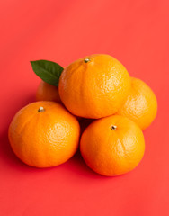 orange on red paper background