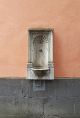 old water fountain in wall
