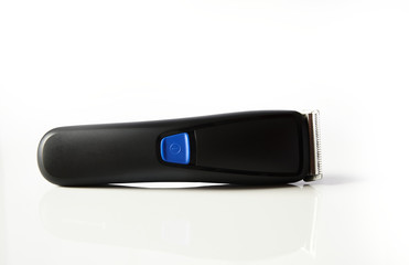 hair cutter machine on a white table front view