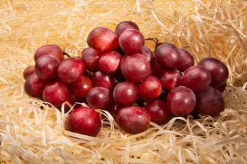 A large bunch of pink grapes