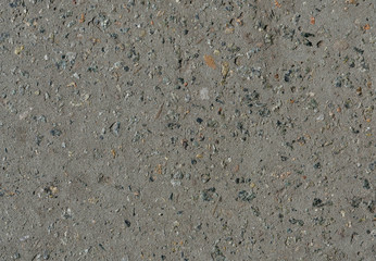 The texture of the concrete from which the road is laid