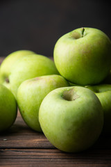 beautiful green apples close-up on the table