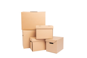 Five cardboard boxes isolated on white background. Empty space for your design.