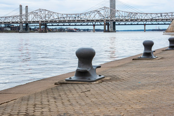Moorings along the Ohio River from Louisville Kentucky looking toward Indiana with Cloudy Sky and...