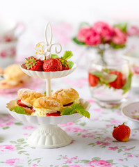 cream puffs with strawberries and whipped cream