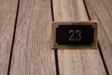  number 23 on wooden background