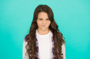 Fototapeta premium I do not like you. Have some doubts. Emotional kid. Girl emotional face. Thoughts and doubts concept. Kid doubtful face. Thoughtful girl hesitating making decision. Weird feeling. Doubts bothering me