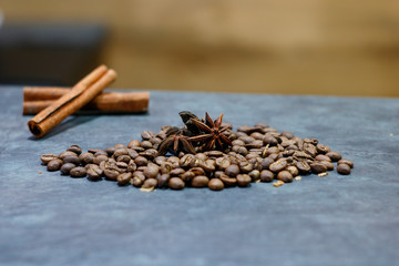 coffee beans, cinnamon sticks, star anise and dry oranges