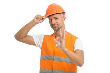 well done. excited electrician show ok gesture. handsome service worker isolated on white. asphalt worker at construction site. just perfect. positive man in helmet. plumber is water supply worker