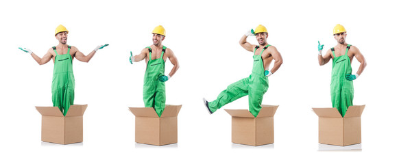 Man in coveralls with boxes