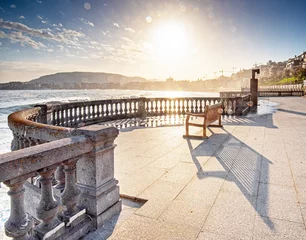 Cercles muraux Destinations Bench at the coast of San Sebastian in the morning