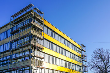 house facade renovation and thermal insulation, scaffolding