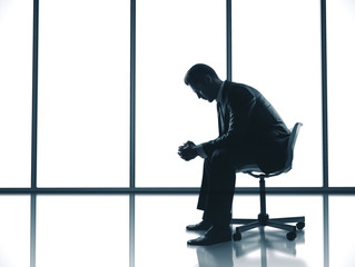 Businessman sitting in office interior