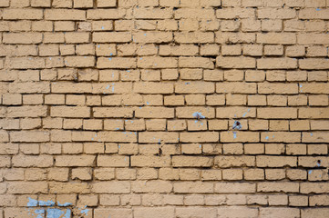 Fototapeta na wymiar Brick wall of the house