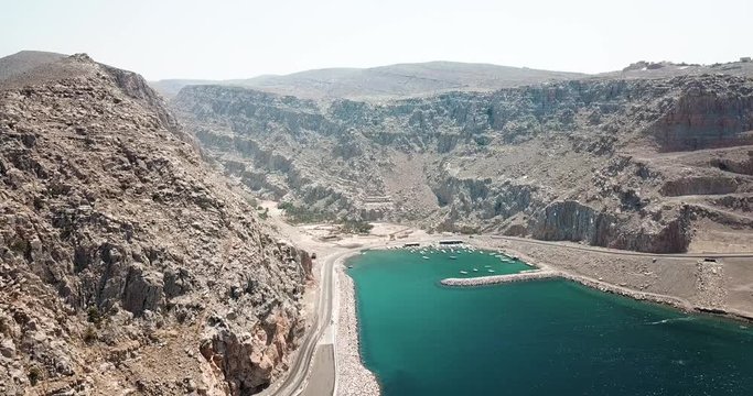Coastal road and seaside in Musandam Governorate of Oman aerial footage