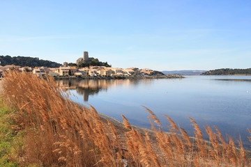 The old town of Gruissan in the heart of Regional Natural Park of Narbonne, dominated by its castle, the ruins of the Barberousse tower and its small fishermen's houses, Aude, France