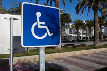 Sign for disabled parking close-up. A clear sunny day.