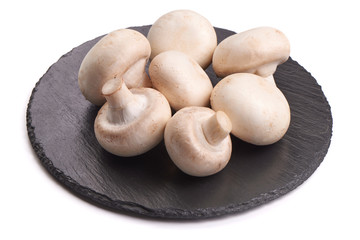 Fototapeta na wymiar Fresh Champignon mushrooms, isolated on white background