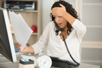 woman lots of work in the office
