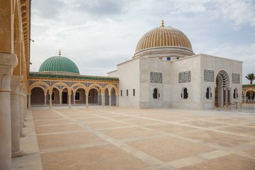 Arches and main building on the yard of the mausoleum of Habib Bourguiba, Monastir, Tunisia, North Africa