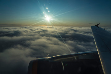 Sunset over the clouds.