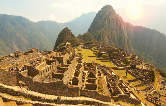 Machu Picchu, Cusco region, Peru: Overview of agriculture terraces, Wayna Picchu and surrounding mountains in the background, UNESCO, World Heritage Site. One of the New Seven Wonders of the World